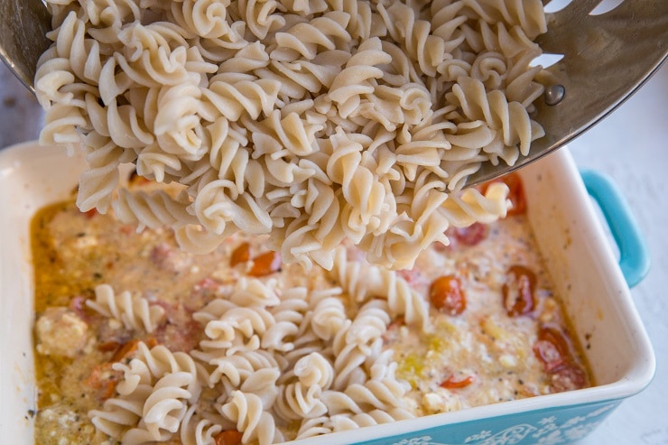 Pour the cooked noodles into the casserole dish with the sauce