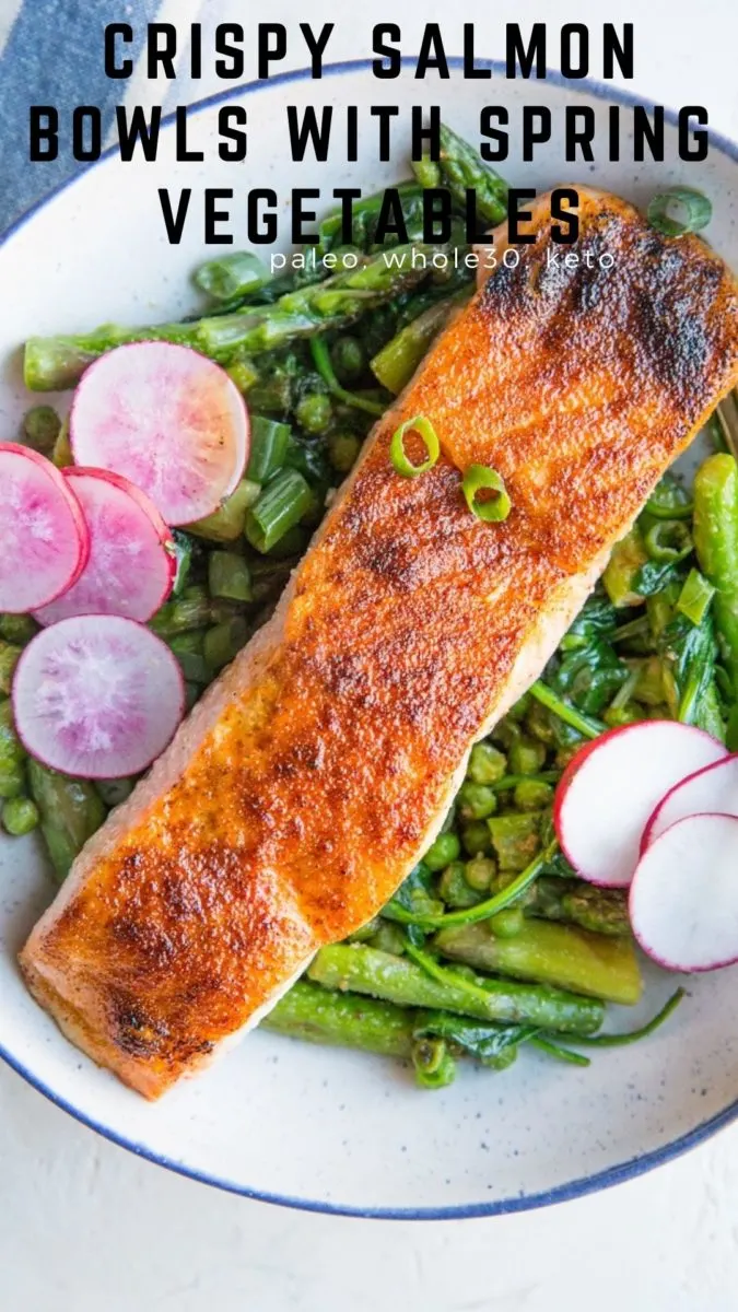 Crispy Salmon Bowls with Sauteed asparagus, onions, garlic, peas, and asparagus. A vibrant, healthy meal that is paleo, whole30, and keto!