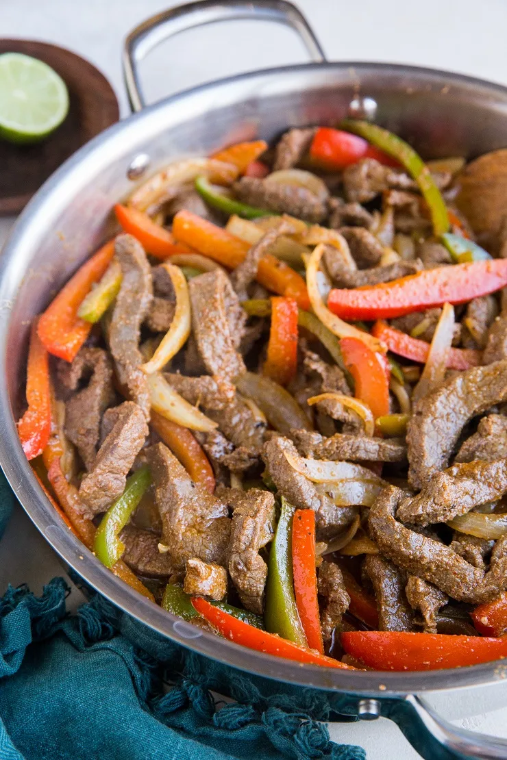 Easy Steak Fajitas - a quick and simple recipe for beef fajitas using only 5 ingredients! Low-carb, paleo, whole30