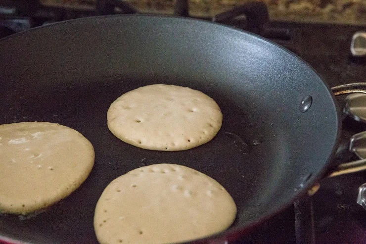 Cook silver dollar pancakes in a large skillet