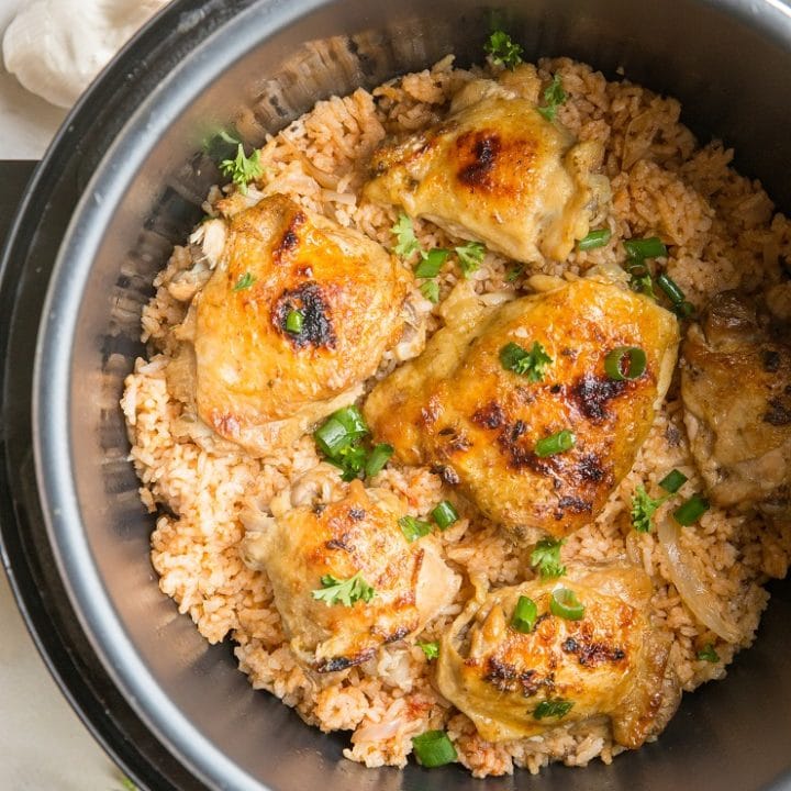Quick and Easy Instant Pot Spanish Rice with Chicken - a super flavorful dinner recipe with perfectly tender chicken