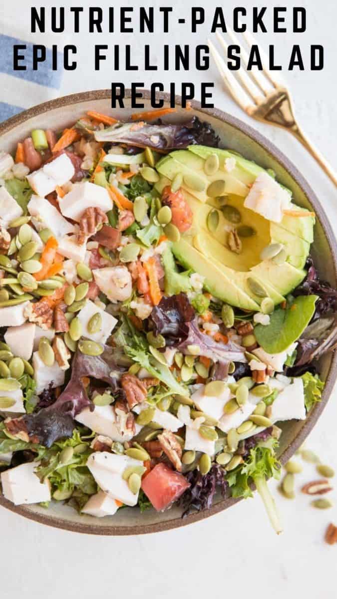 The BEST Filling Salad Recipe! An entree salad recipe with roast chicken, avocado, pumpkin seeds, greens, and more! Super satiating, clean, fresh, vibrant, and delicious! #paleo #whole30 