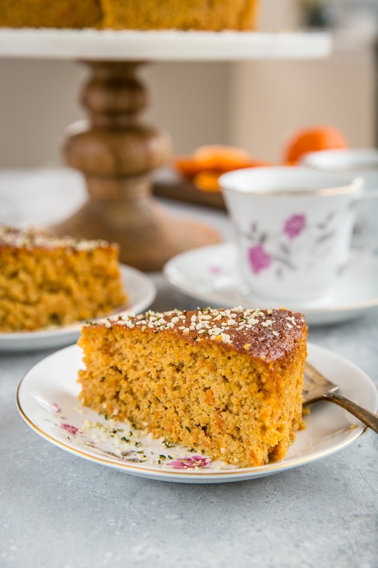 close up slice of paleo clementine cake on a fancy plate