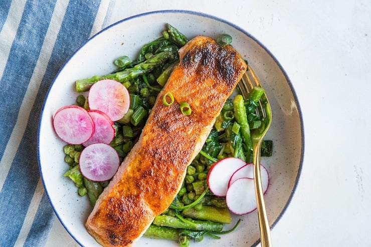 Spring Salmon Bowls with asparagus, peas, spinach, and radishes. A healthy, vibrant dinner recipe!