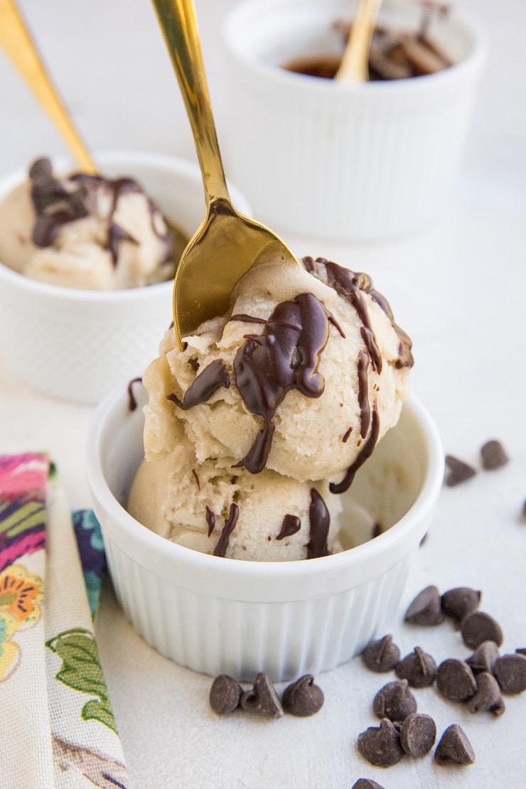 Spoon digging into creamy ice cream