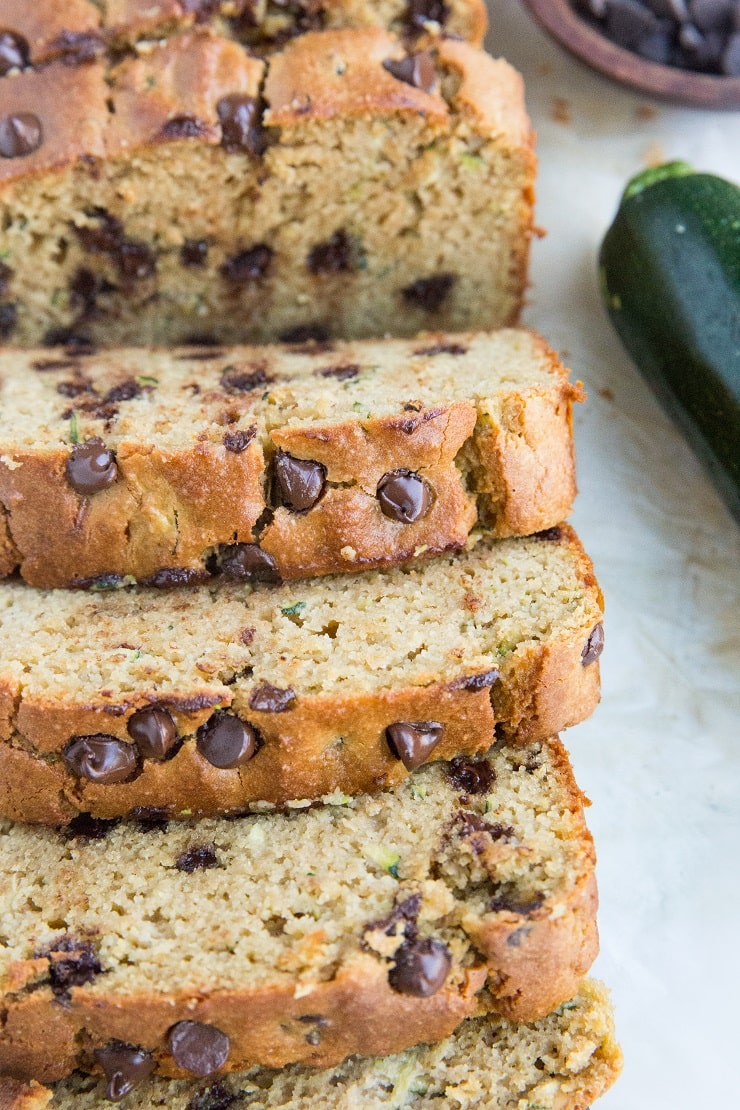 Paleo Almond Flour Zucchini Bread sweetened with coconut sugar. Dairy free, gluten free, refined sugar free, moist, fluffy and amazing!