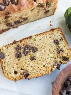 The BEST Almond Flour Zucchini Bread - grain-free, dairy-free, refined sugar-free, INSANELY moist and fluffy. Bake a loaf of this chocolate chip studded bliss every week!