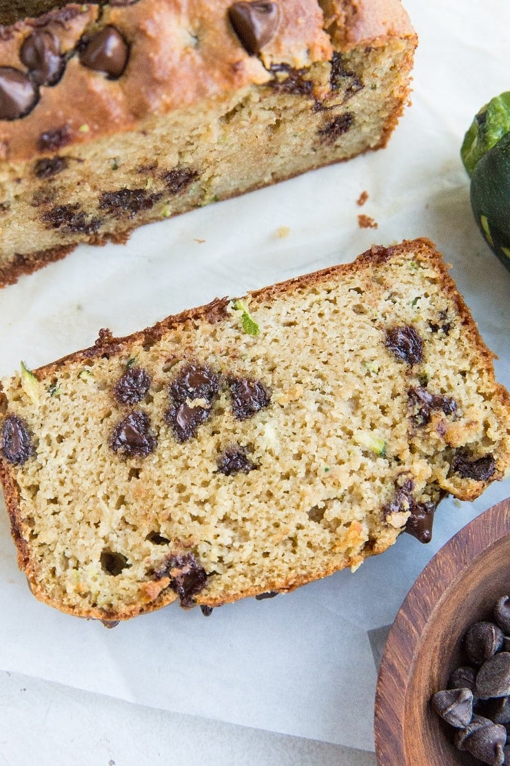 The BEST Almond Flour Zucchini Bread - grain-free, dairy-free, refined sugar-free, INSANELY moist and fluffy. Bake a loaf of this chocolate chip studded bliss every week!