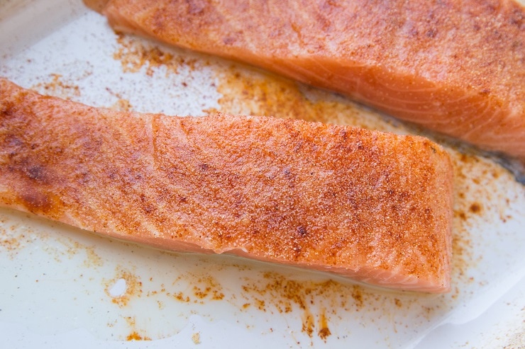 Season salmon with avocado oil, sea salt, paprika and garlic powder