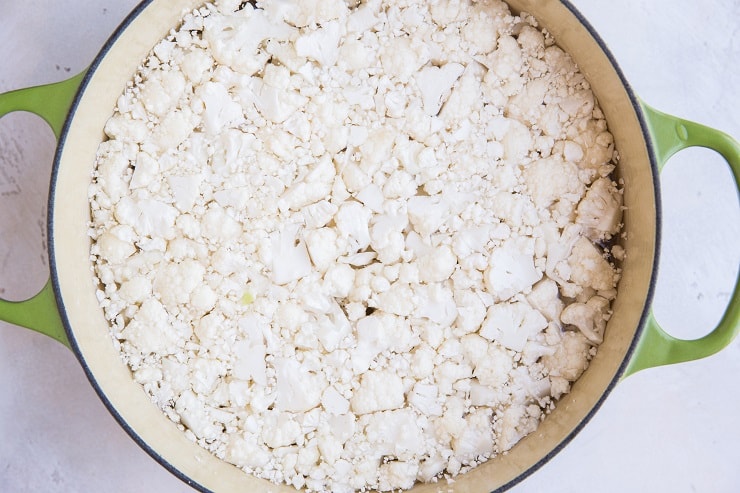 Chopped cauliflower in a pot of water