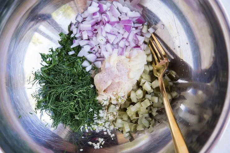 Dressing ingredients in a bowl for potato salad