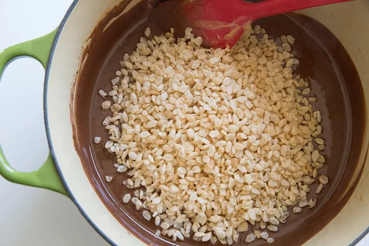 Stir in the cacao and crispy rice cereal
