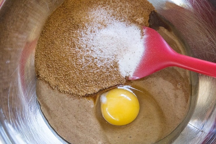 Ingredients for almond butter cookies in a mixing bowl