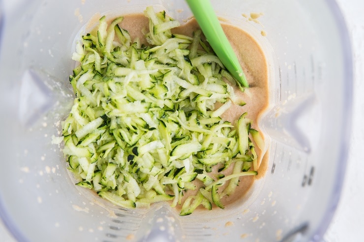 blender with zucchini bread batter