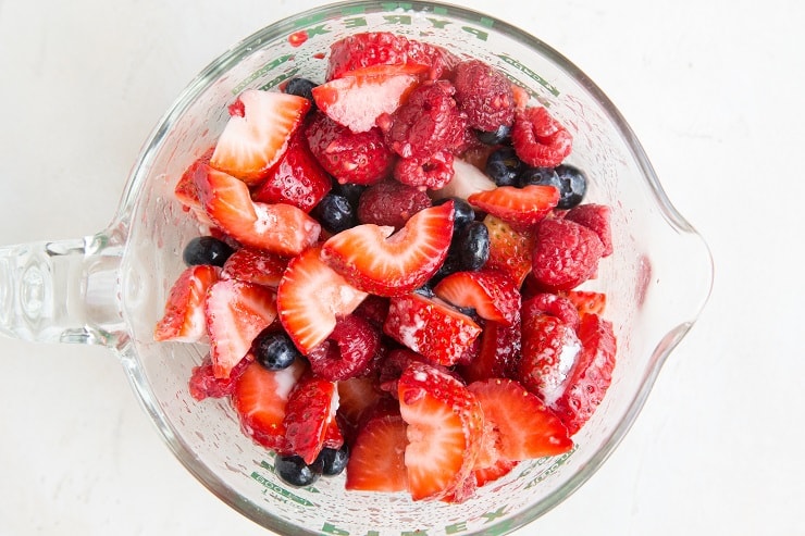 Combine berries and sweetener for cobbler filling