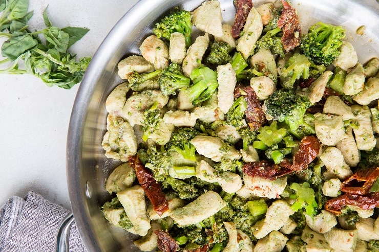 Easy 4-Ingredient Pesto Chicken and Broccoli with sun-dried tomatoes is the quickest, easiest healthy dinner recipe!