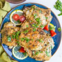 Greek Chicken recipe with a fresh lemon herb marinade. Tasty baked chicken ideal for weeknight meals or meal prep.