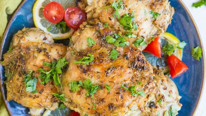 Greek Chicken recipe with a fresh lemon herb marinade. Tasty baked chicken ideal for weeknight meals or meal prep.