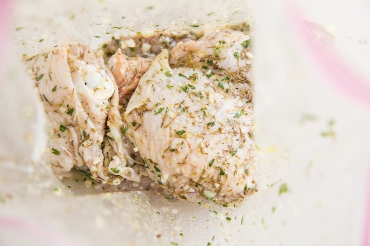 Place chicken and marinade in a zip lock bag