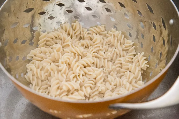 Cooked pasta in a collander