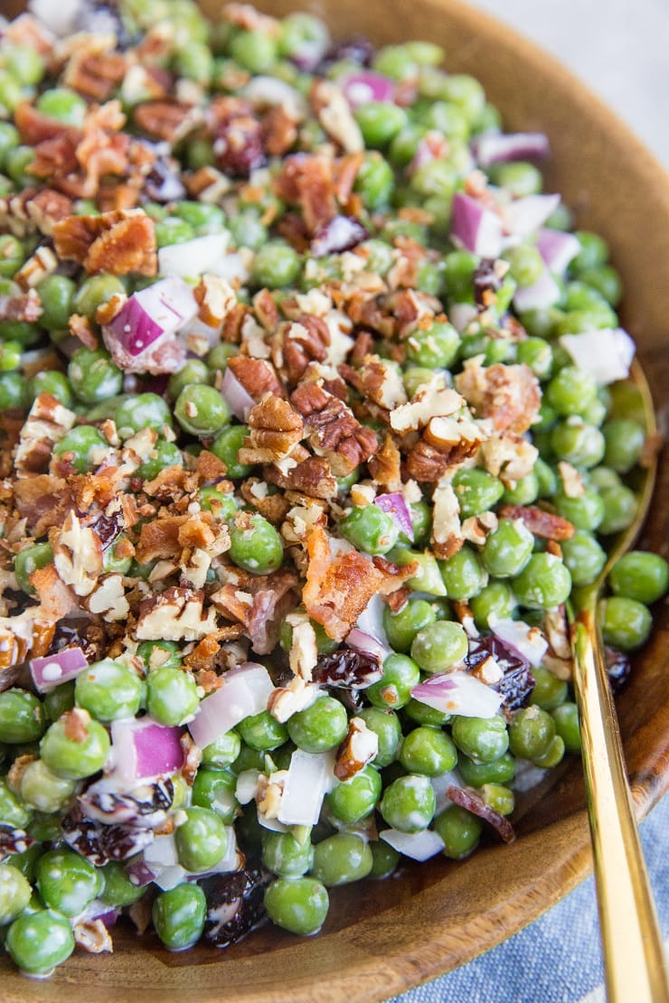 Mayo-Free Pea Salad with dried cranberries, bacon, pecans, red onion for a delicious summer side dish for any picnic or barbecue