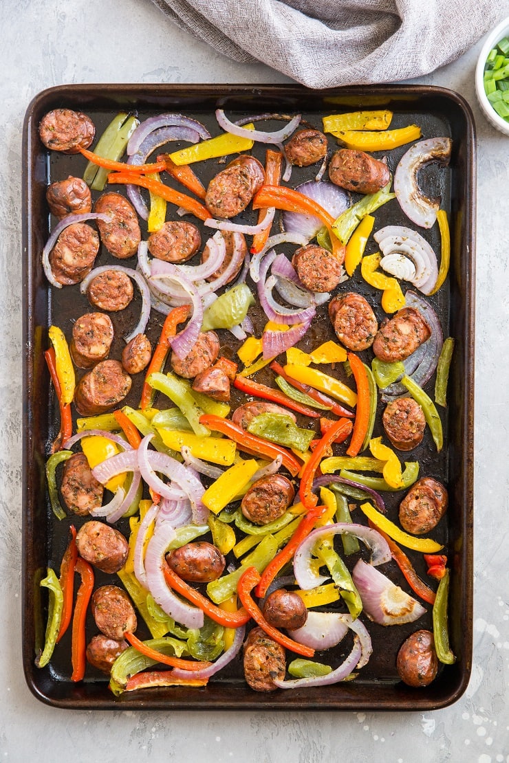 Easy Sheet Pan Sausage and Peppers - a quick and easy dinner recipe requiring few ingredients and 30 minutes or less!