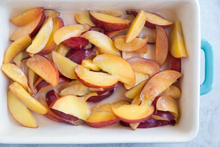 Toss the ingredients for the peach filling in a mixing bowl and then transfer to a small casserole dish