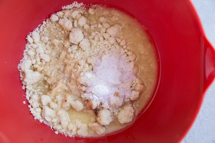 Ingredients for almond flour biscuits in a mixing bowl