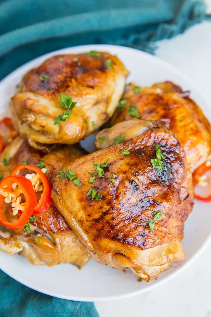 Teriyaki Chicken baked in the oven with few ingredients. A delicious chicken thigh recipe that will rock your world!
