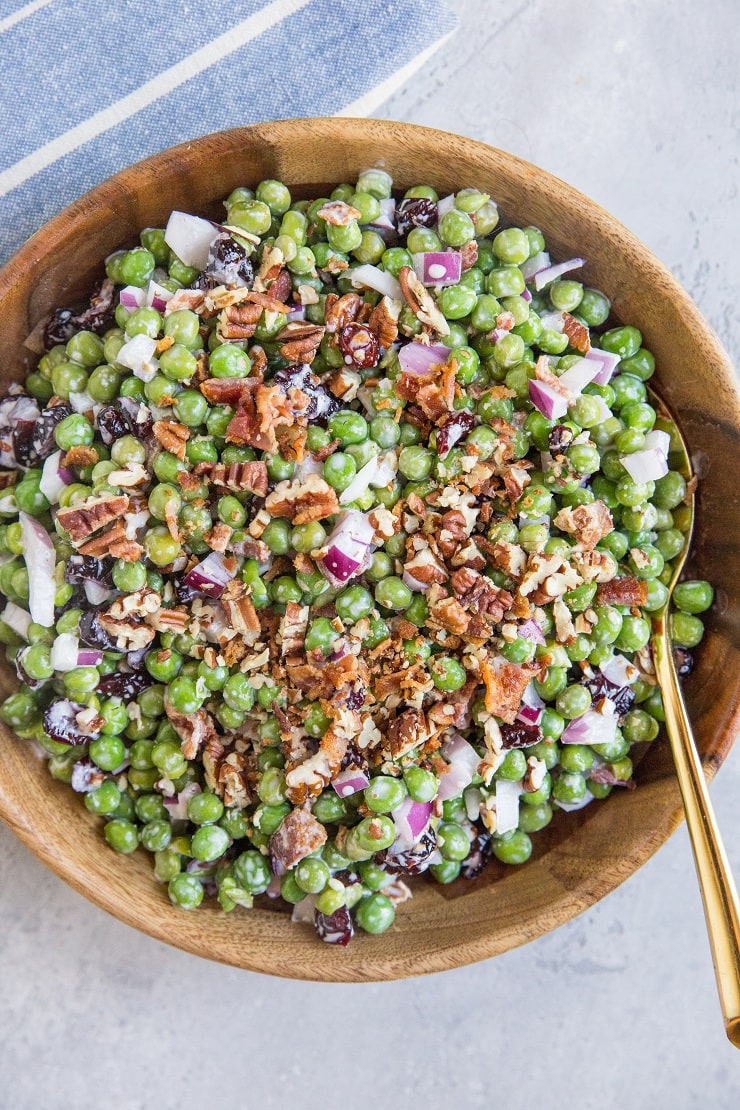 Mayo-Free Pea Salad with Bacon, dried cranberries, pecans, and red onion. Light, fresh, and delicious!