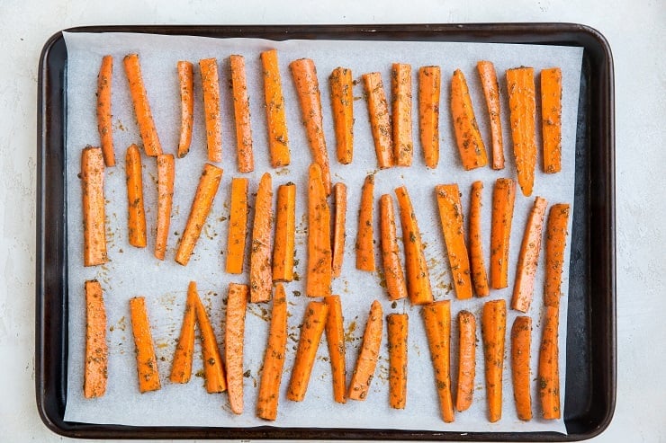 Spread carrots on a parchment-lined baking sheet to bake into fries