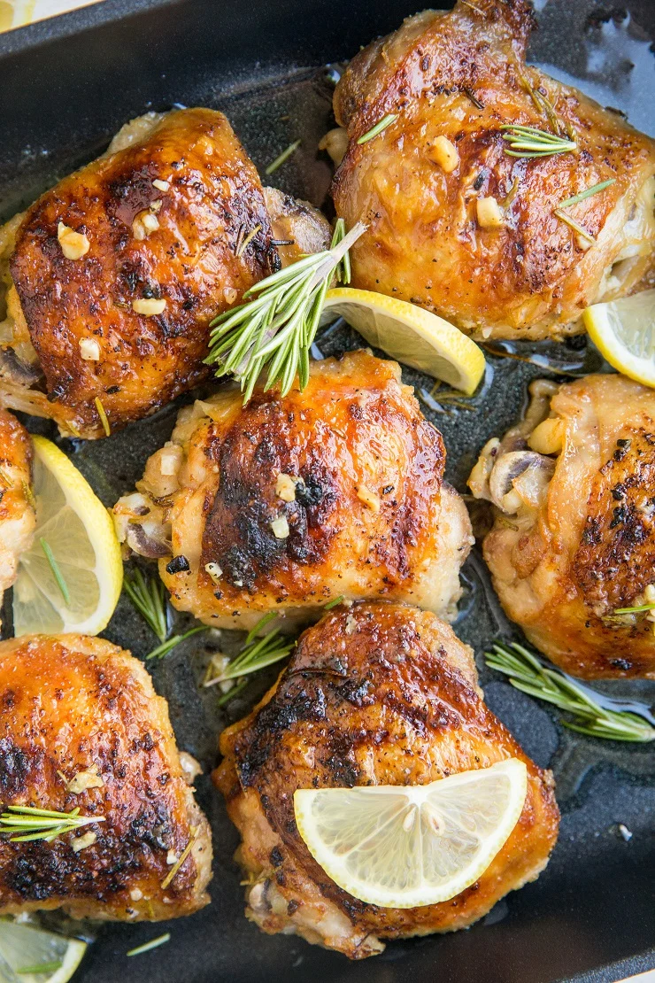 Easy Lemon Garlic Baked Rosemary Chicken Thighs - quick, easy, insanely delicious and healthy chicken recipe