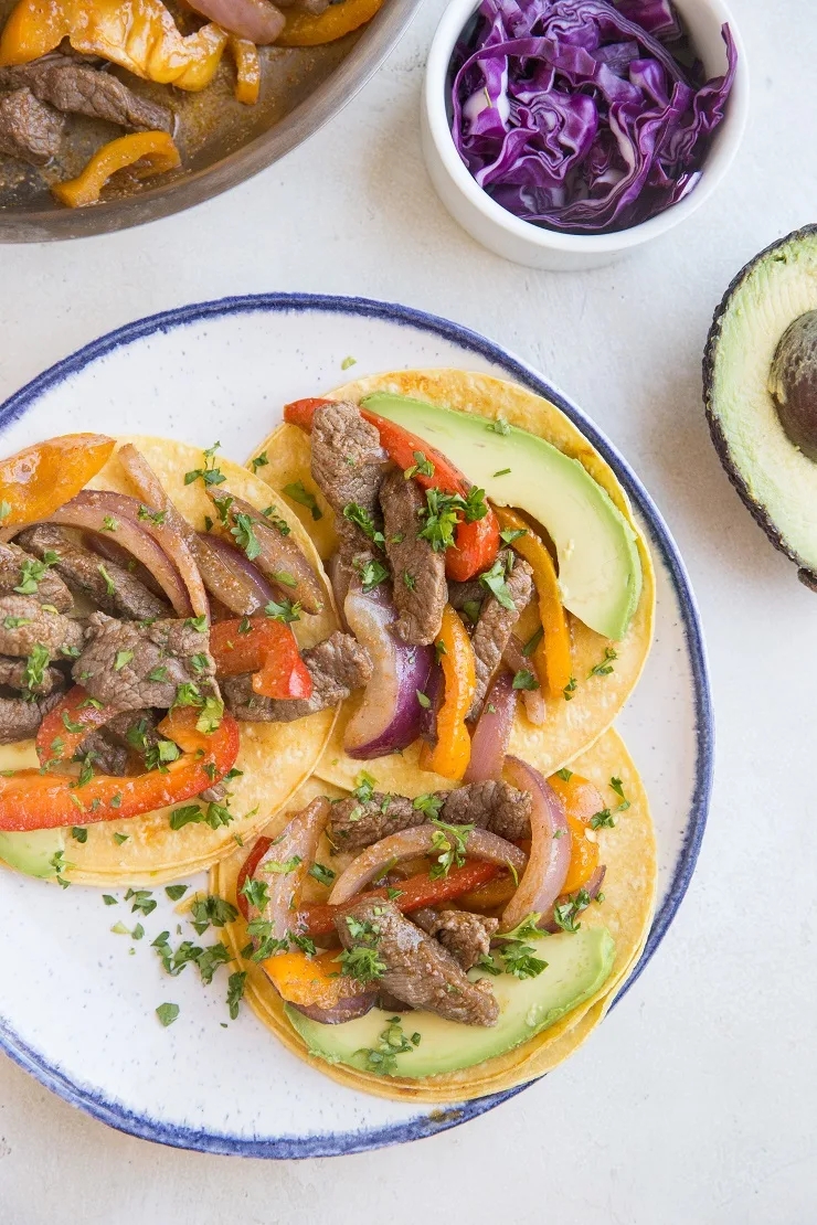 Easy Steak Fajitas made with only a few basic ingredients. These incredibly flavorful fajitas can be used in tacos, burritos, burrito bowls, and more!
