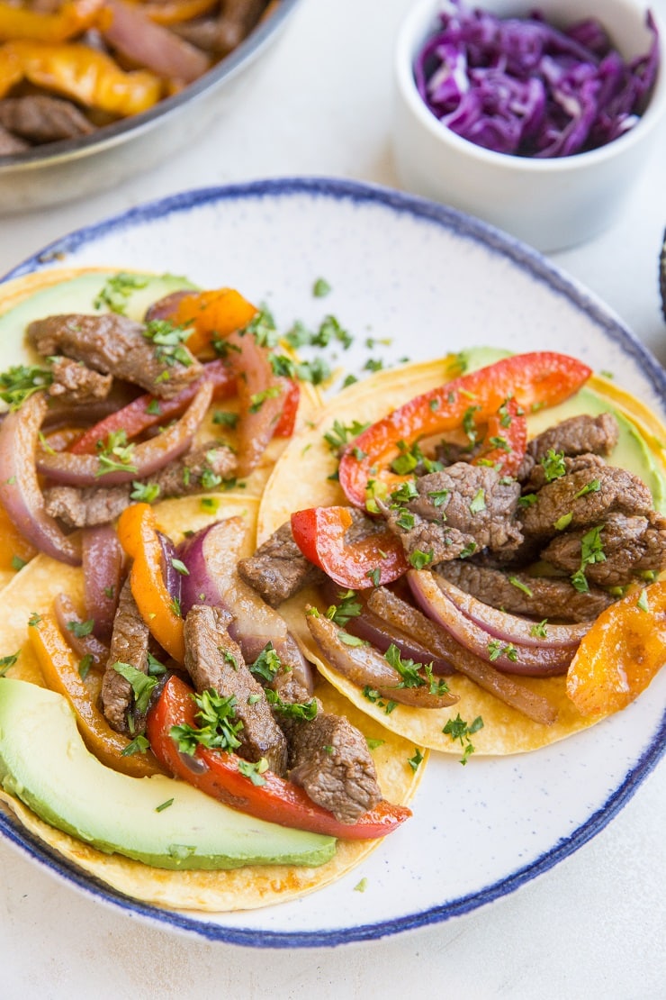 Delicious 5-Ingredient Easy Steak Fajitas that are so quick to prepare! Use steak fajitas in burritos, tacos, tostadas, burrito bowls, and more!