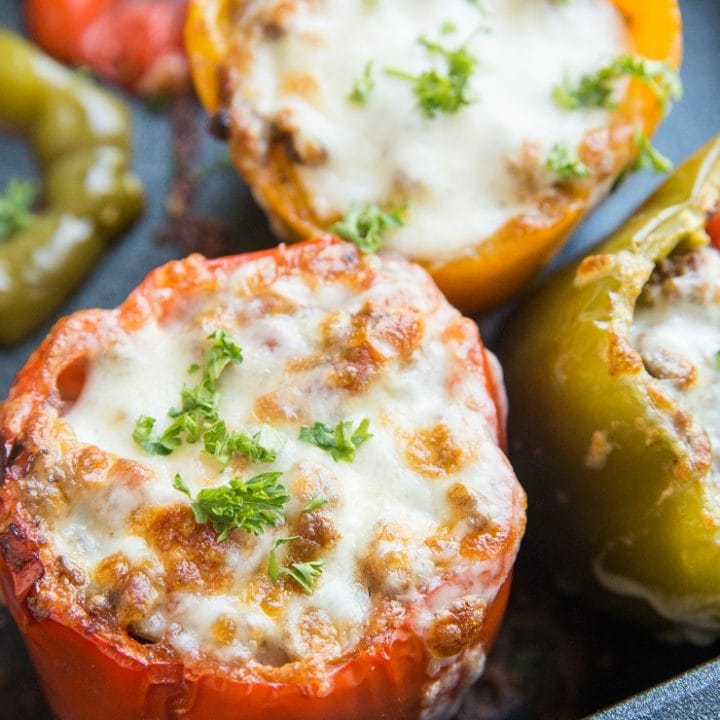 Easy Stuffed Bell Peppers made with just 10 basic ingredients! A quick and tasty dinner recipe that is filling and delicious.