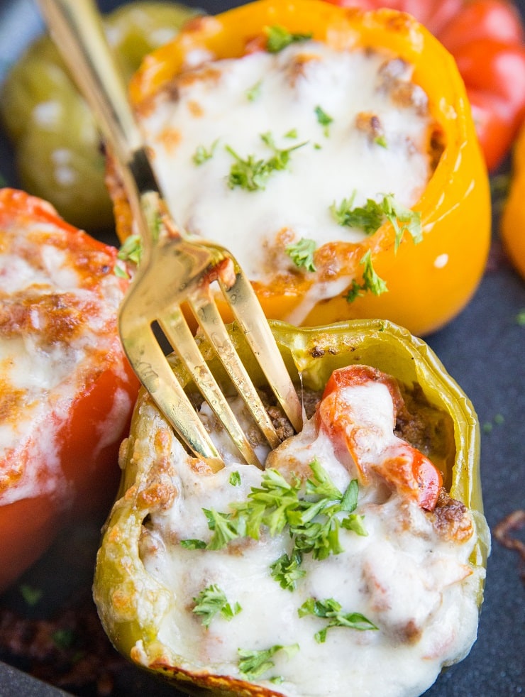 Easy Baked Beef Stuffed Peppers made taco-style. Delicious cheesy stuffed peppers are easy and flavorful