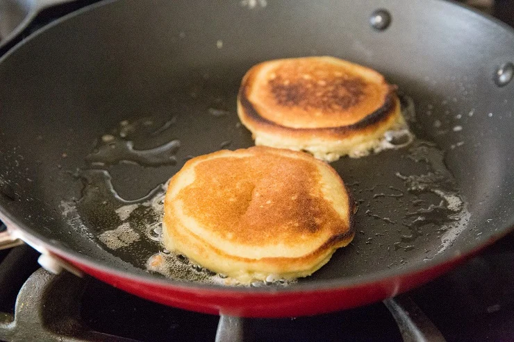 Cooking coconut flour keto pancakes on the stove top