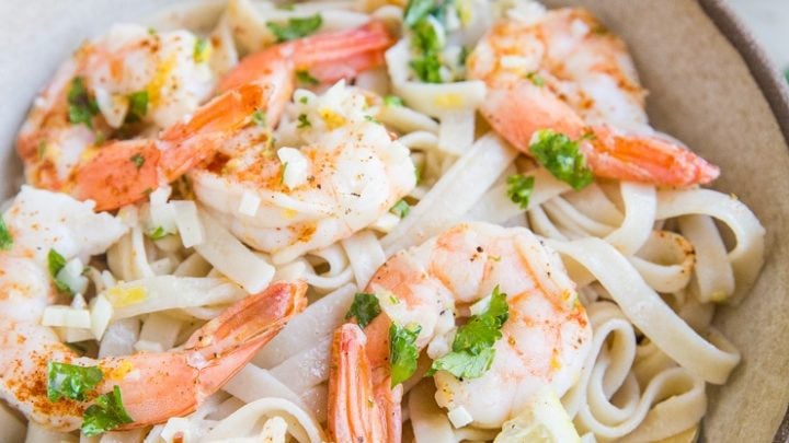 Quick and easy creamy garlic lemon shrimp pasta. Comes together in less than 30 minutes