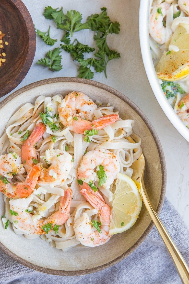 Creamy Lemon Garlic Shrimp Pasta made gluten-free and dairy-free! This zesty, luscious, comforting easy pasta recipe comes together quickly for any night of the week!