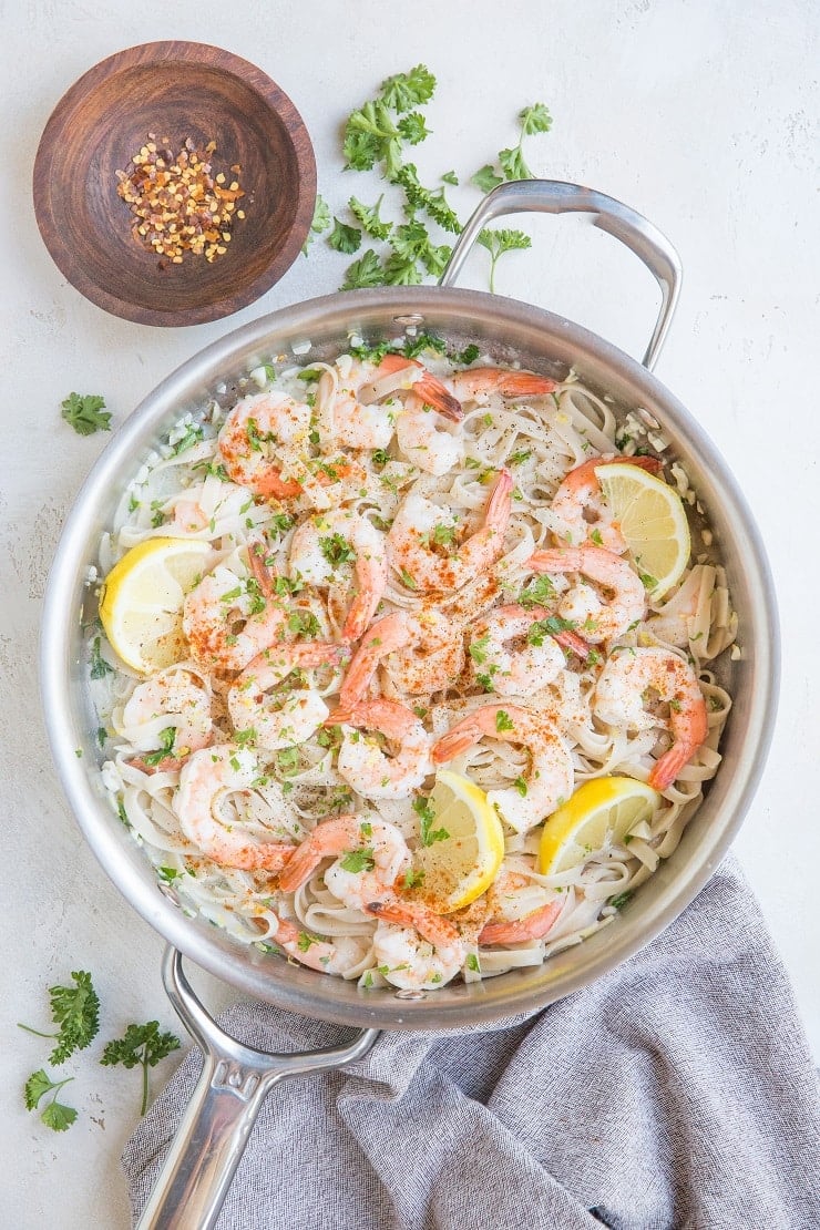 Easy Lemon Garlic Shrimp Pasta with a creamy dairy-free sauce. Zesty, creamy, garlicky PERFECT pasta for an amazing romantic meal!