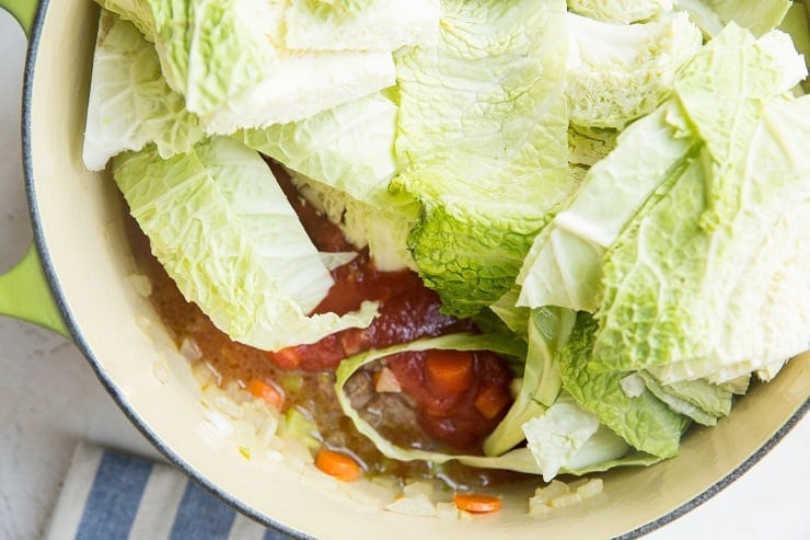 All of the ingredients for unstuffed cabbage bowls in a pot