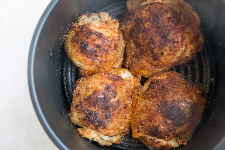 Crispy Air Fryer Chicken Thighs finished in the air fryer