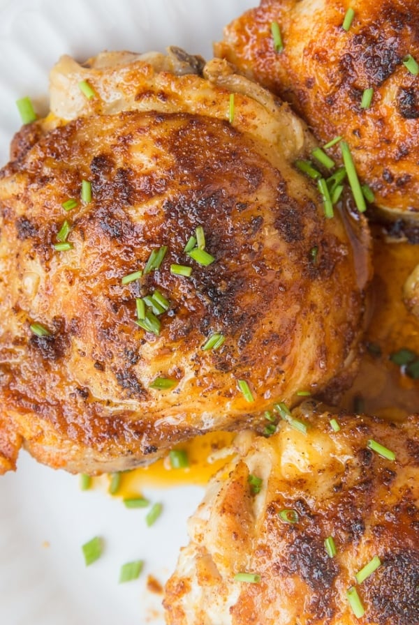 Air Fryer Crispy Chicken Thighs made with just a few simple ingredients is a goof-proof method for cooking chicken thighs. Crispy, tender, delicious!