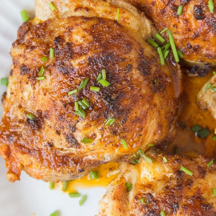 Air Fryer Crispy Chicken Thighs made with just a few simple ingredients is a goof-proof method for cooking chicken thighs. Crispy, tender, delicious!