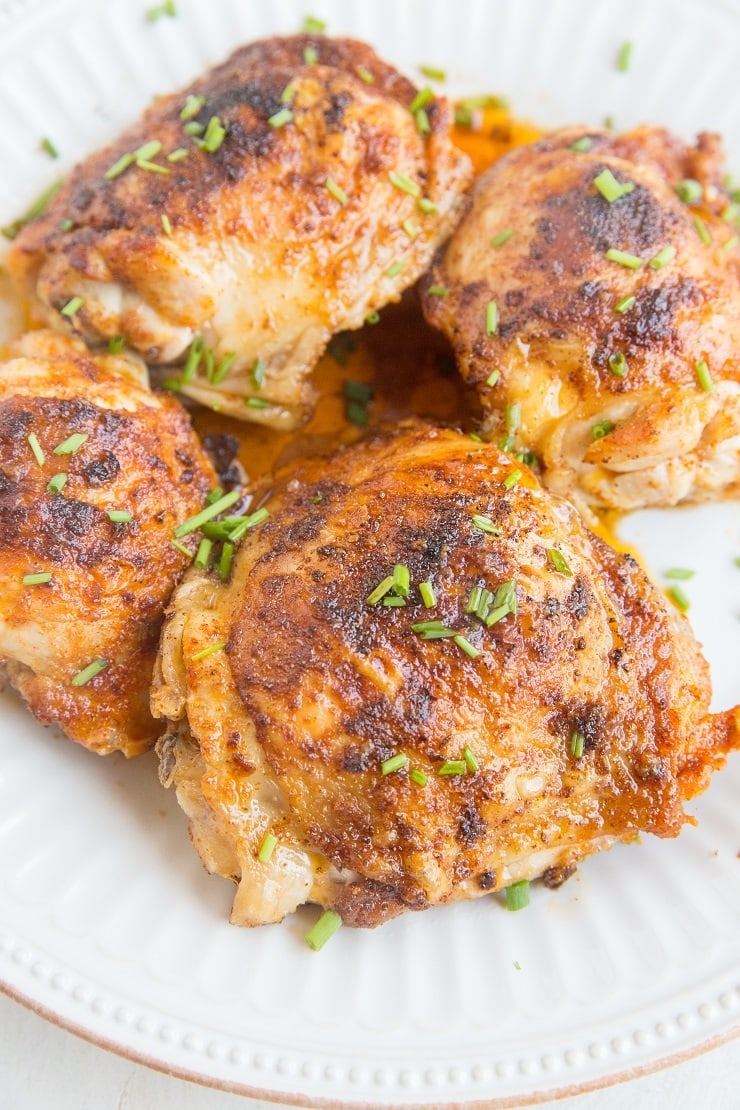 Air Fryer Chicken Thighs - a quick and easy method for making the most amazing crispy, tender bone-in chicken thighs!