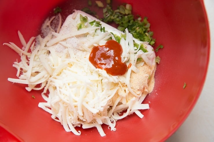 Ingredients for cream cheese stuffing in a mixing bowl