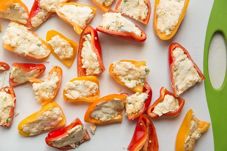 Stuff the mini sweet peppers with the cream cheese filling