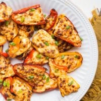 Air Fryer Cream Cheese Stuffed Mini Peppers - an easy low-carb keto appetizer recipe made lightning quick! An epic crowd pleaser of a bite!