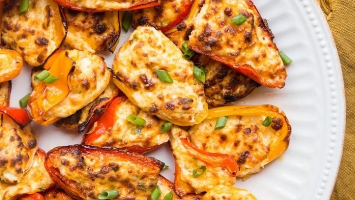Air Fryer Cream Cheese Stuffed Mini Peppers - an easy low-carb keto appetizer recipe made lightning quick! An epic crowd pleaser of a bite!