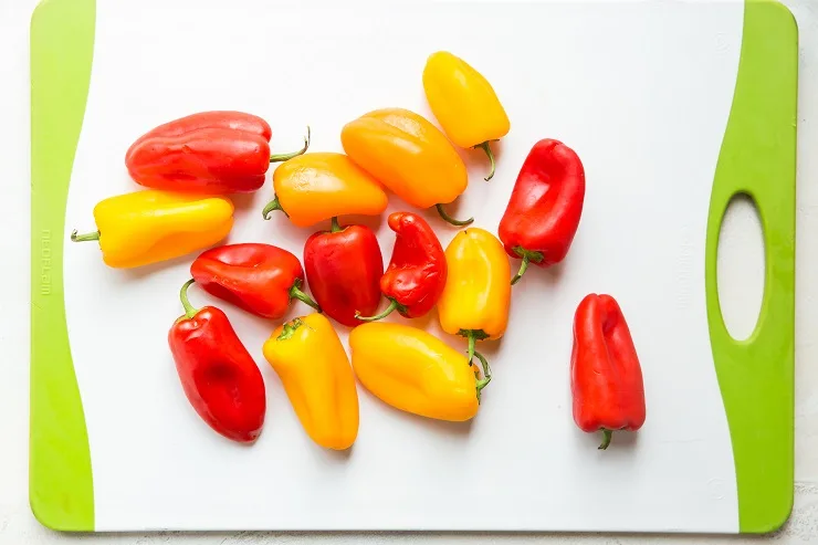 Sweet mini peppers on a cutting board